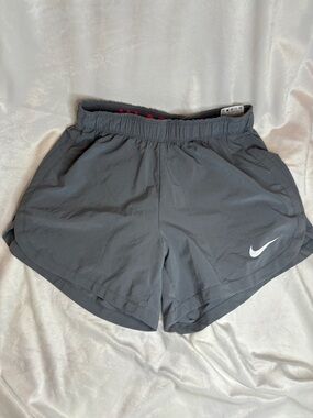 Nike Women's Gray Athletic Shorts with White Swoosh
